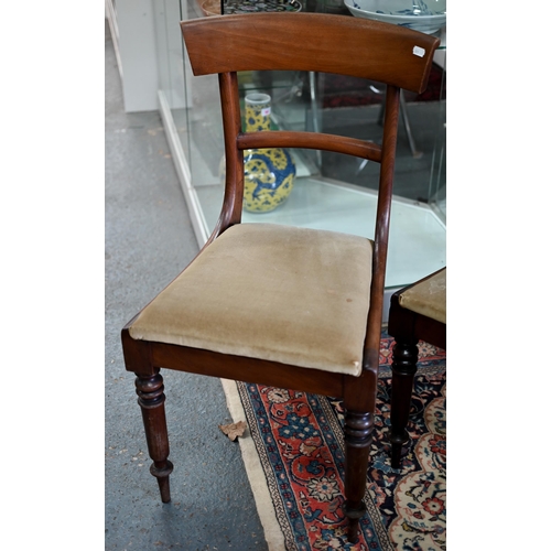 633 - A set of six Victorian mahogany bar back dining chairs, with fabric seat pads, raised on turned fron... 