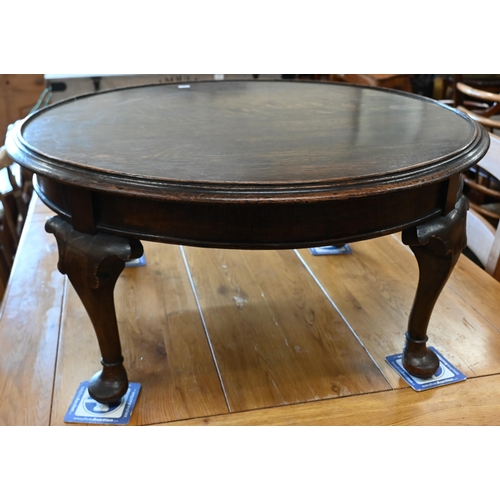 645 - A low circular oak coffee table, 72 cm diam x 38 cm high