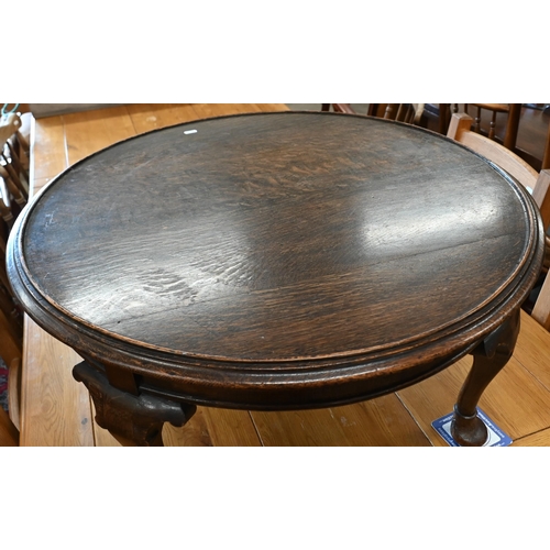 645 - A low circular oak coffee table, 72 cm diam x 38 cm high