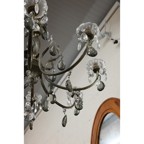 647 - An eight-branch electrolier chandelier with faceted glass drops