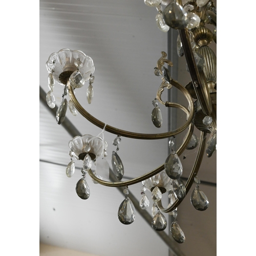 647 - An eight-branch electrolier chandelier with faceted glass drops