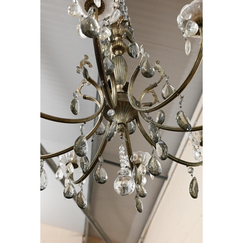 647 - An eight-branch electrolier chandelier with faceted glass drops