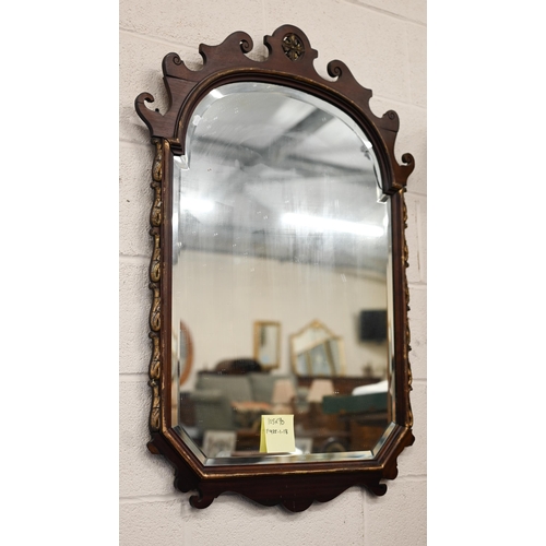 659 - Large fret-cut mahogany framed mirror with arched and bevelled plate in parcel gilt frame 105 x 70cm... 