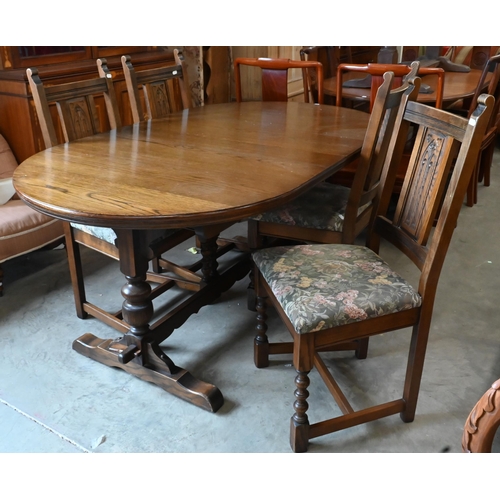 660 - A 'Wood Brothers' Old Charm extending dining table with leaf, on turned pillars tied with a stretche... 