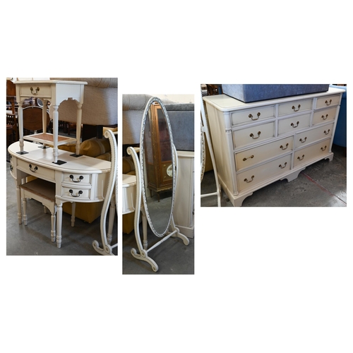 672 - Laura Ashley, a part bedroom suite in vintage cream/yellow including a ten drawer chest, 144 cm x 48... 