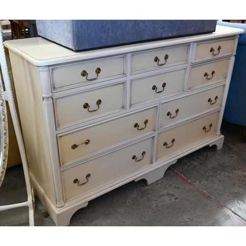 672 - Laura Ashley, a part bedroom suite in vintage cream/yellow including a ten drawer chest, 144 cm x 48... 