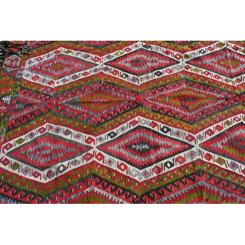 676 - A Turkish geometric design kelim, 210 x 130 cm 