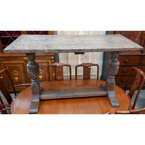 683 - A small burr elm refectory table with cleated ends, on cup and cover supports, 122 x 56 cm