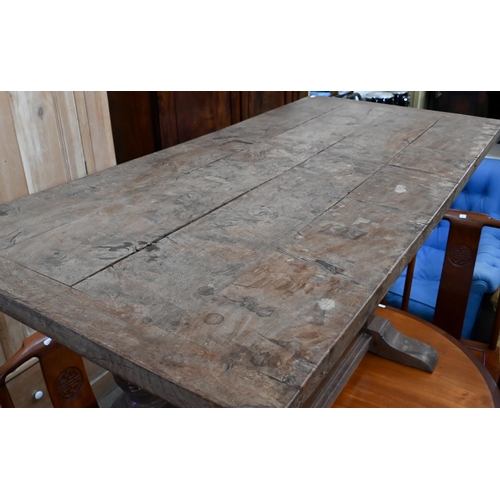 683 - A small burr elm refectory table with cleated ends, on cup and cover supports, 122 x 56 cm