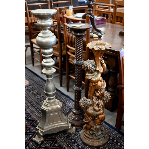 687 - A composite cherub torchere stand to/w two other torchere stands; one spiral turned mahogany and one... 