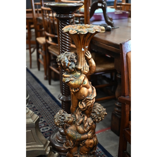 687 - A composite cherub torchere stand to/w two other torchere stands; one spiral turned mahogany and one... 