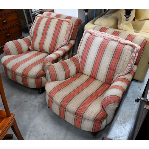 688 - A pair of mahogany framed country house armchairs in red/beige striped fabric upholstery