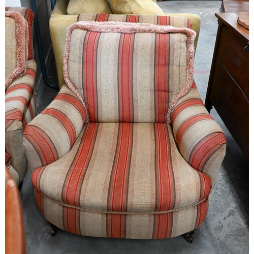 688 - A pair of mahogany framed country house armchairs in red/beige striped fabric upholstery