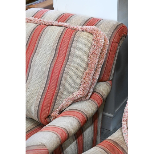 688 - A pair of mahogany framed country house armchairs in red/beige striped fabric upholstery