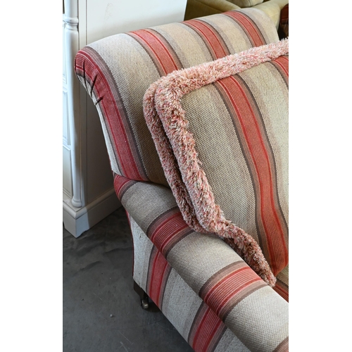 688 - A pair of mahogany framed country house armchairs in red/beige striped fabric upholstery