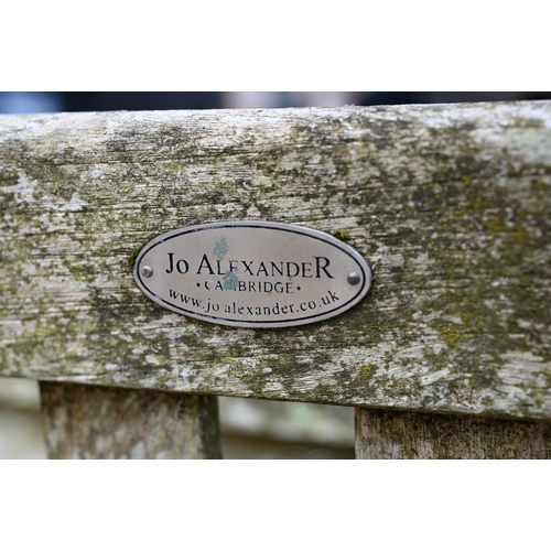 8 - Jo Alexander - a weathered solid teak garden dining set comprising a rectangular table and four armc... 