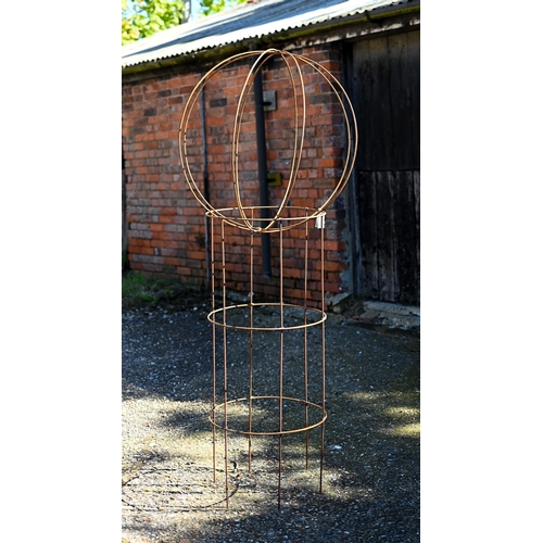 88 - A weathered steel sweet pea garden frame with separate sphere top, sphere diam 65 cm, height of fram... 