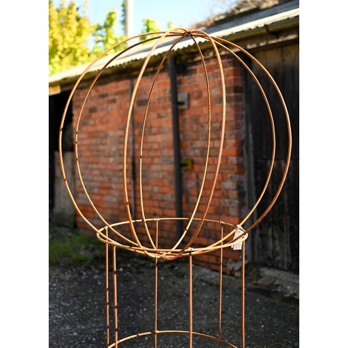 88 - A weathered steel sweet pea garden frame with separate sphere top, sphere diam 65 cm, height of fram... 