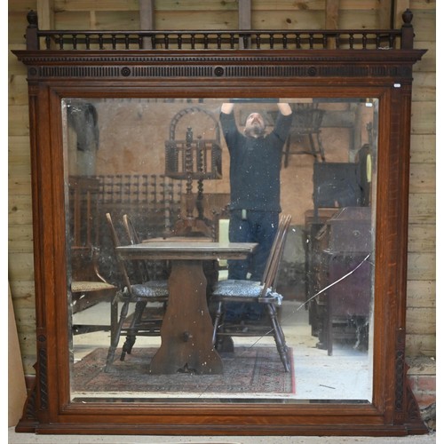 332 - #A large late 19th century oak over-mantel, with bevel edged mirror, a/f, 183 cm x 49 cm x 82 cm h