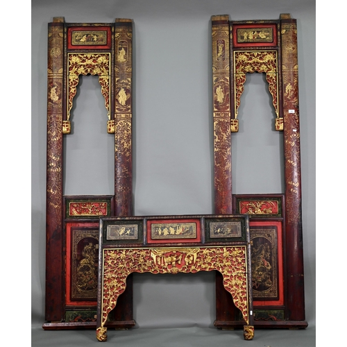 320A - A 19th century Chinese red and black lacquered three section wedding bed panel decoratively carved a... 