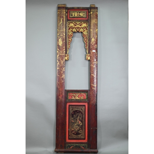 320A - A 19th century Chinese red and black lacquered three section wedding bed panel decoratively carved a... 