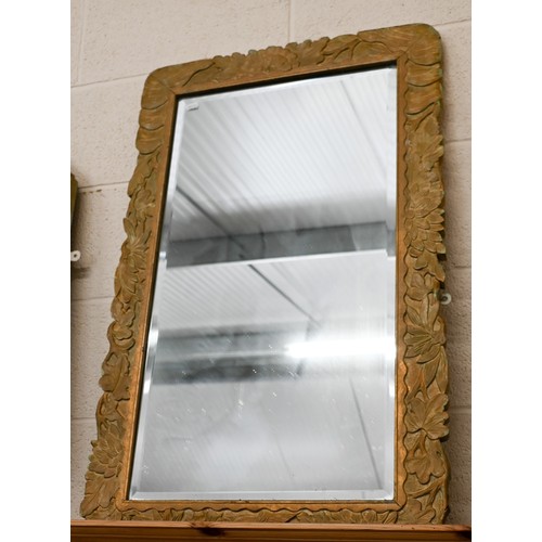 160A - A bevelled octagonal mirror in rippled painted framed, 82 x 56 cm to/w Continental bevelled mirror i... 