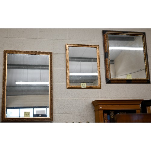 177A - Two modern gilt framed mirrors (69 x 53 cm and 100 x 70 cm) to/w another example in black painted an... 