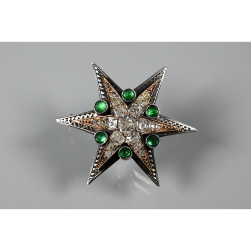 289 - A Victorian diamond and emerald star-shaped brooch, the six point star gold set with mixed cut diamo... 