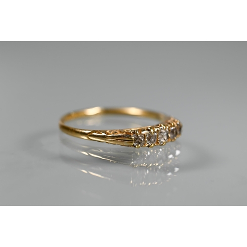 291 - An antique five stone diamond ring, the old cut graduated diamonds in 18ct yellow gold shank, fully ... 