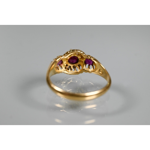 293 - An antique ruby and diamond cluster ring, the central oval ruby surrounded by small eight-cut diamon... 