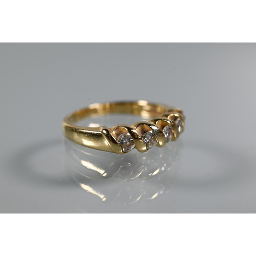 294 - A five-stone diamond ring, the round brilliant cut diamonds in rope-style setting, yellow metal stam... 