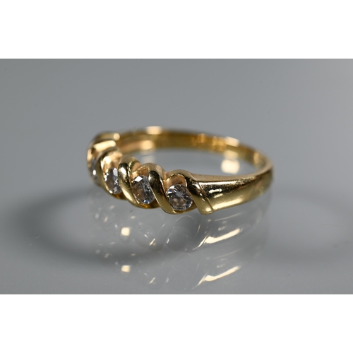 294 - A five-stone diamond ring, the round brilliant cut diamonds in rope-style setting, yellow metal stam... 