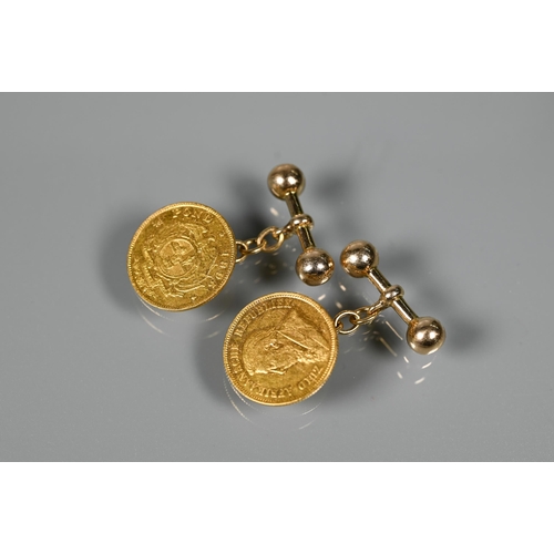 296 - A pair of South African 1/2 Pond coins dated 1895, set as cufflinks with 18ct chain and bar, approx ... 