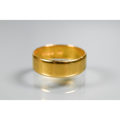 306 - A 22ct yellow gold wide wedding band, size U, approx 6.3g