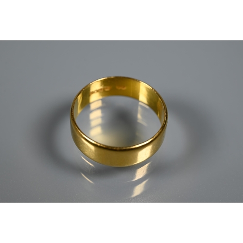 306 - A 22ct yellow gold wide wedding band, size U, approx 6.3g