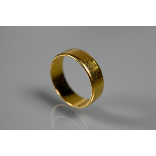 306 - A 22ct yellow gold wide wedding band, size U, approx 6.3g