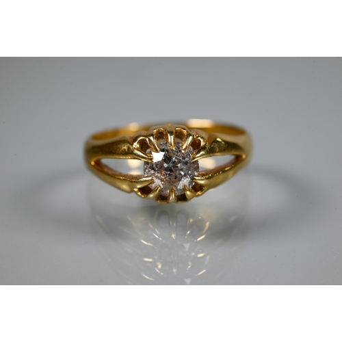 311 - A Victorian single stone diamond ring in yellow gold, the old European cut stone claw set in a gentl... 