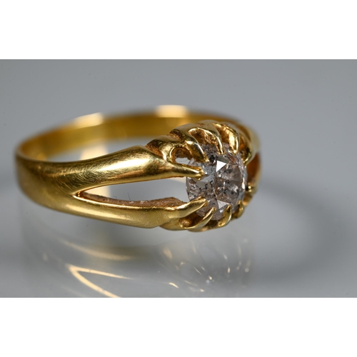 311 - A Victorian single stone diamond ring in yellow gold, the old European cut stone claw set in a gentl... 