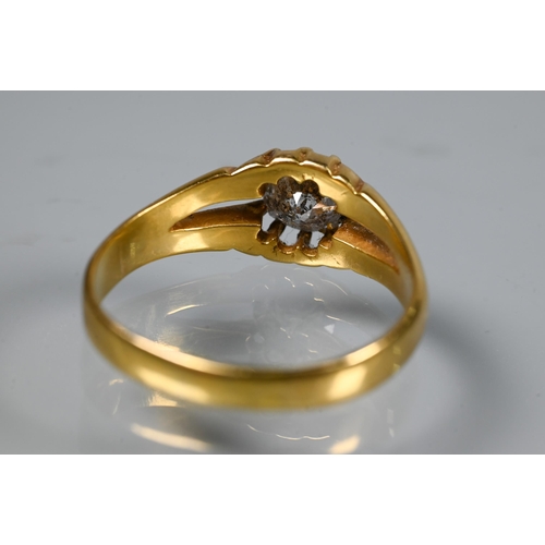 311 - A Victorian single stone diamond ring in yellow gold, the old European cut stone claw set in a gentl... 