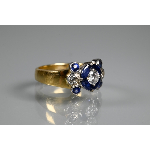 316 - An sapphire and diamond cluster ring, the central round brilliant cut diamond surrounded by four mar... 