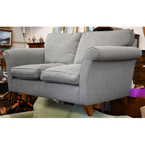 164 - #A modern two-seater scroll arm sofa with grey fabric upholstery, 176 x 90 x 80 cm high