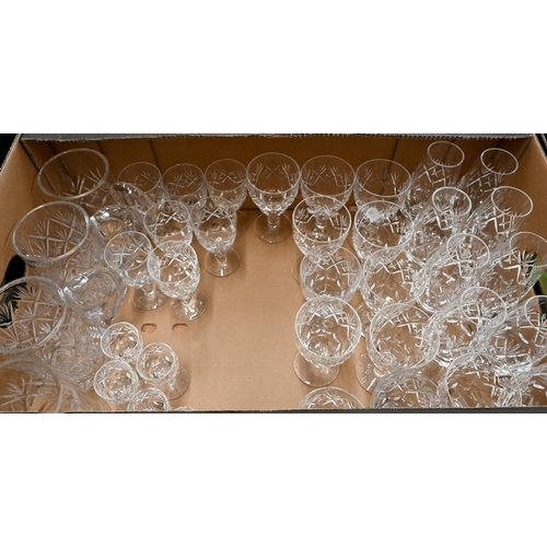 421 - A suite of good quality cut drinking glasses including red and white wine, spirit tumblers, champagn... 