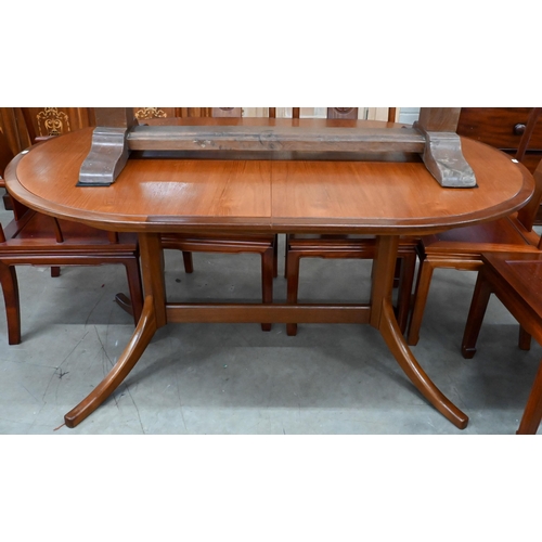 247 - # A mid-century Meredew teak and afromosia oval dining table, 195 x 95 cm