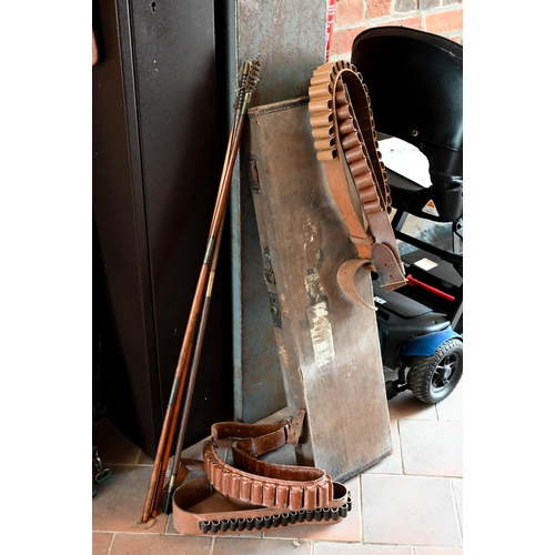 107 - Two old gun cabinets to/w four cartridge belts, a gun case, cleaning rods, rifle carry case etc