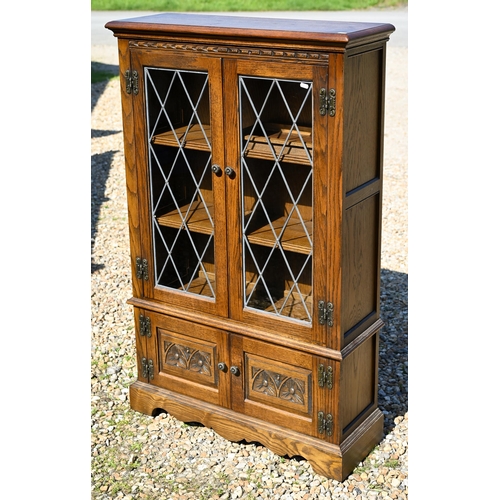 117 - Two similar Old Charm oak lattice lead glazed-in bookcases, 80 cm x 28 cm x 128 cm h and 54 cm x 49 ... 