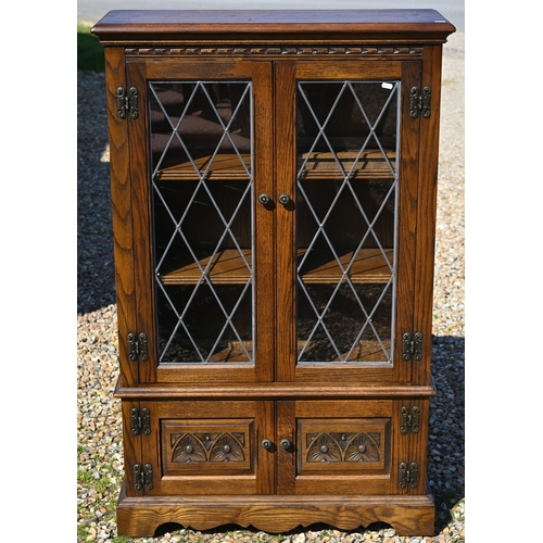 117 - Two similar Old Charm oak lattice lead glazed-in bookcases, 80 cm x 28 cm x 128 cm h and 54 cm x 49 ... 