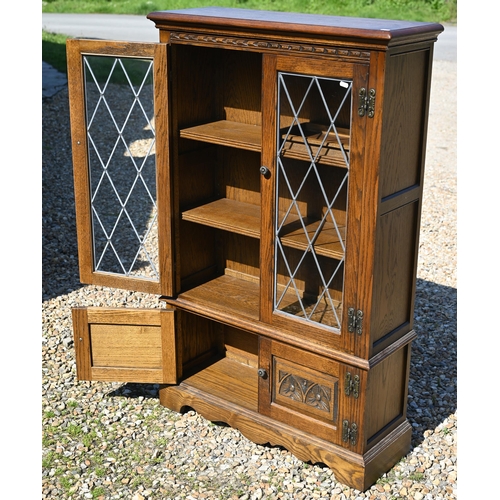 117 - Two similar Old Charm oak lattice lead glazed-in bookcases, 80 cm x 28 cm x 128 cm h and 54 cm x 49 ... 