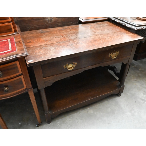 133 - A 19th century oak side table with single frieze drawer, turned supports and open undertier, 92 x 50... 