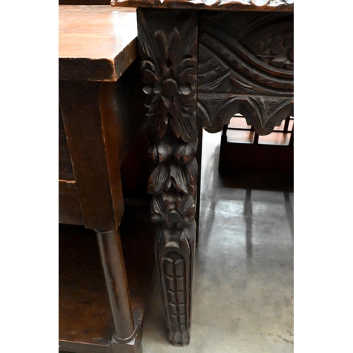 135 - A continental carved oak console table, 104 x 42 x 78 cm high