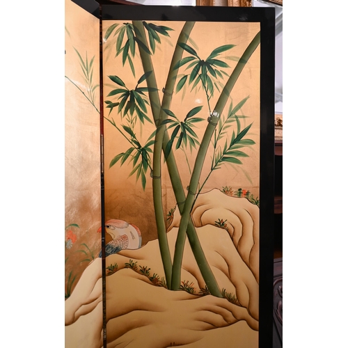 138 - A Chinese lacquered four panel folding screen with gilt and polychrome landscape and birds, 160 cm w... 